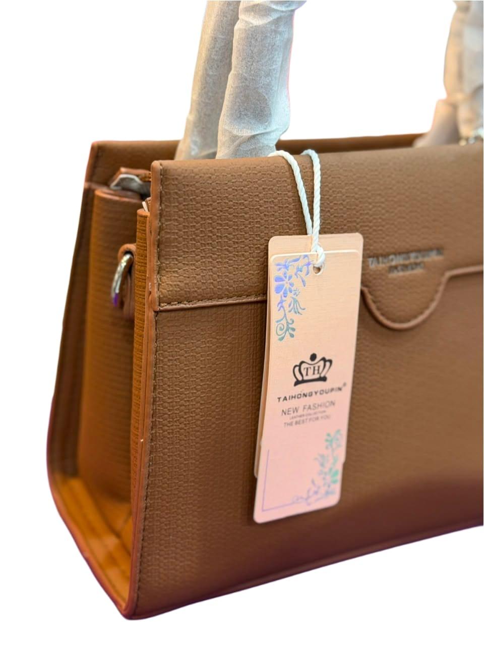 Elegant Black Top Handle Satchel Bag with Floral Charm