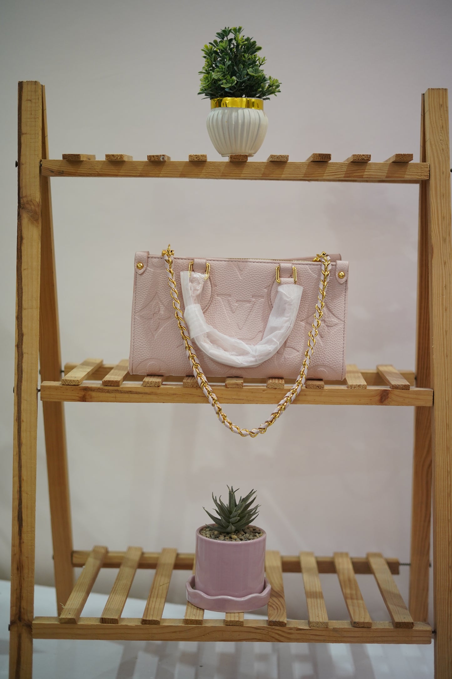 A5. Louis Vuitton Blush Bag