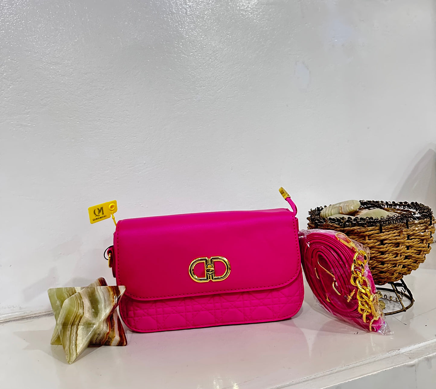 Pink quilted crossbody bag