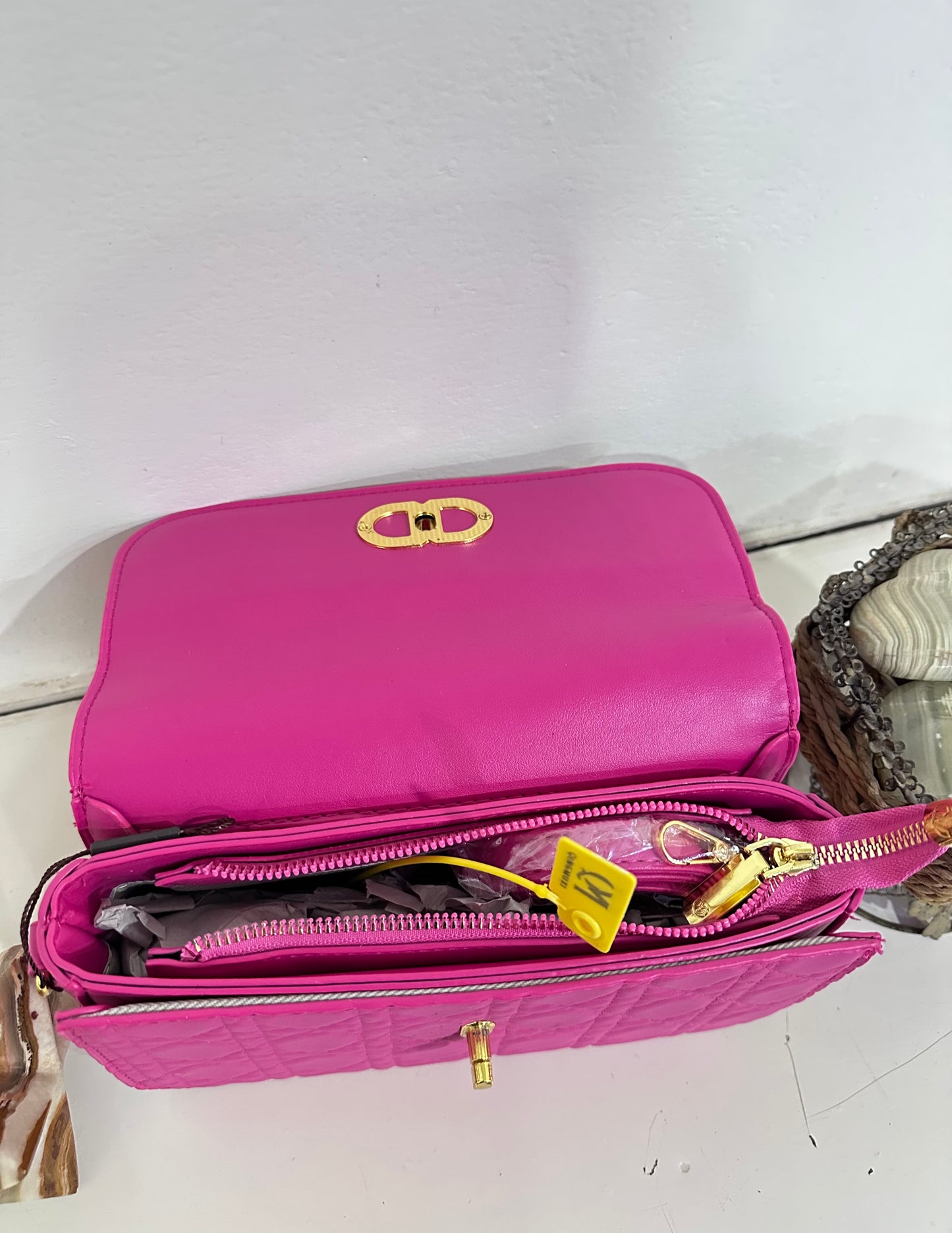 Pink quilted crossbody bag