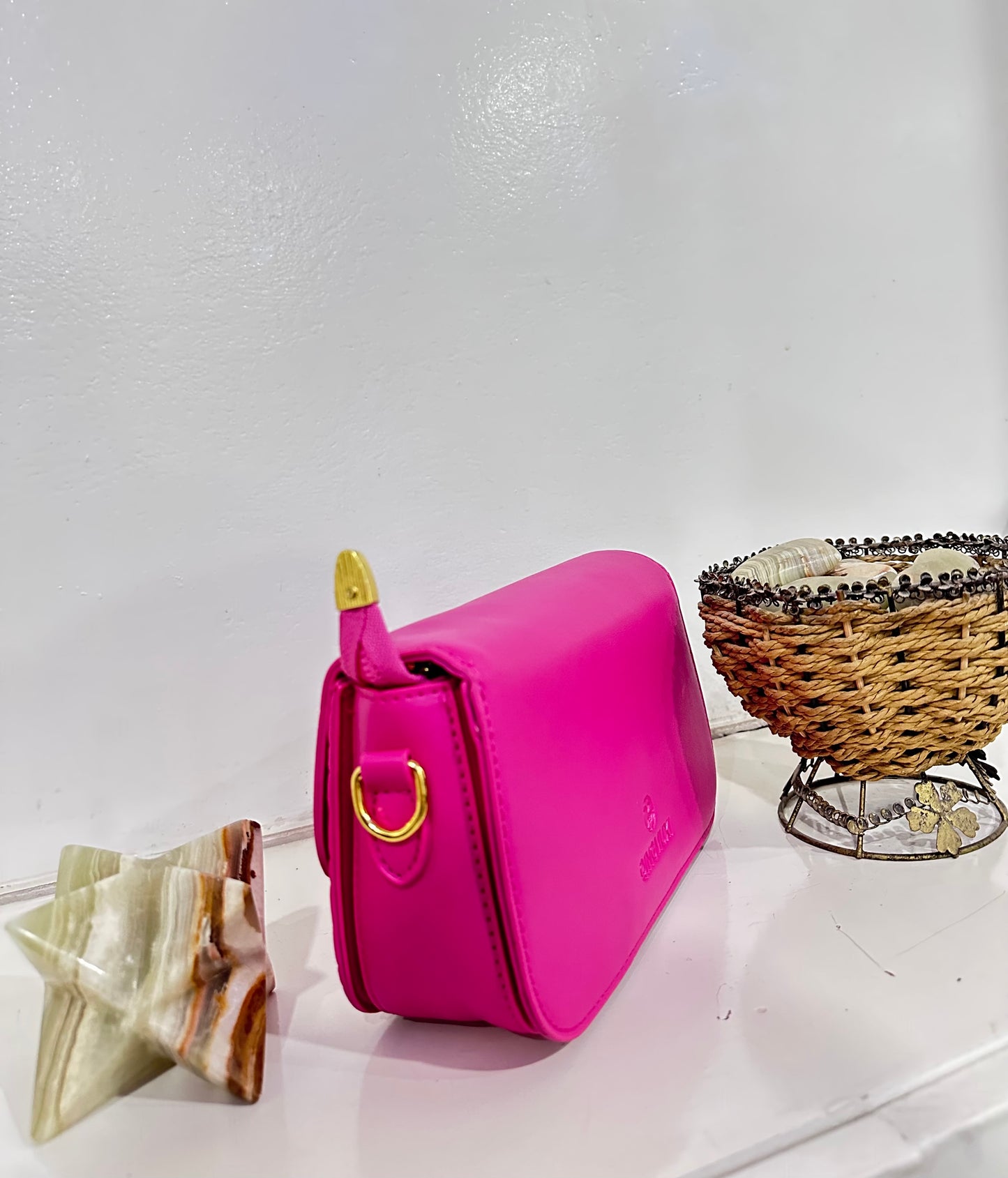 Pink quilted crossbody bag