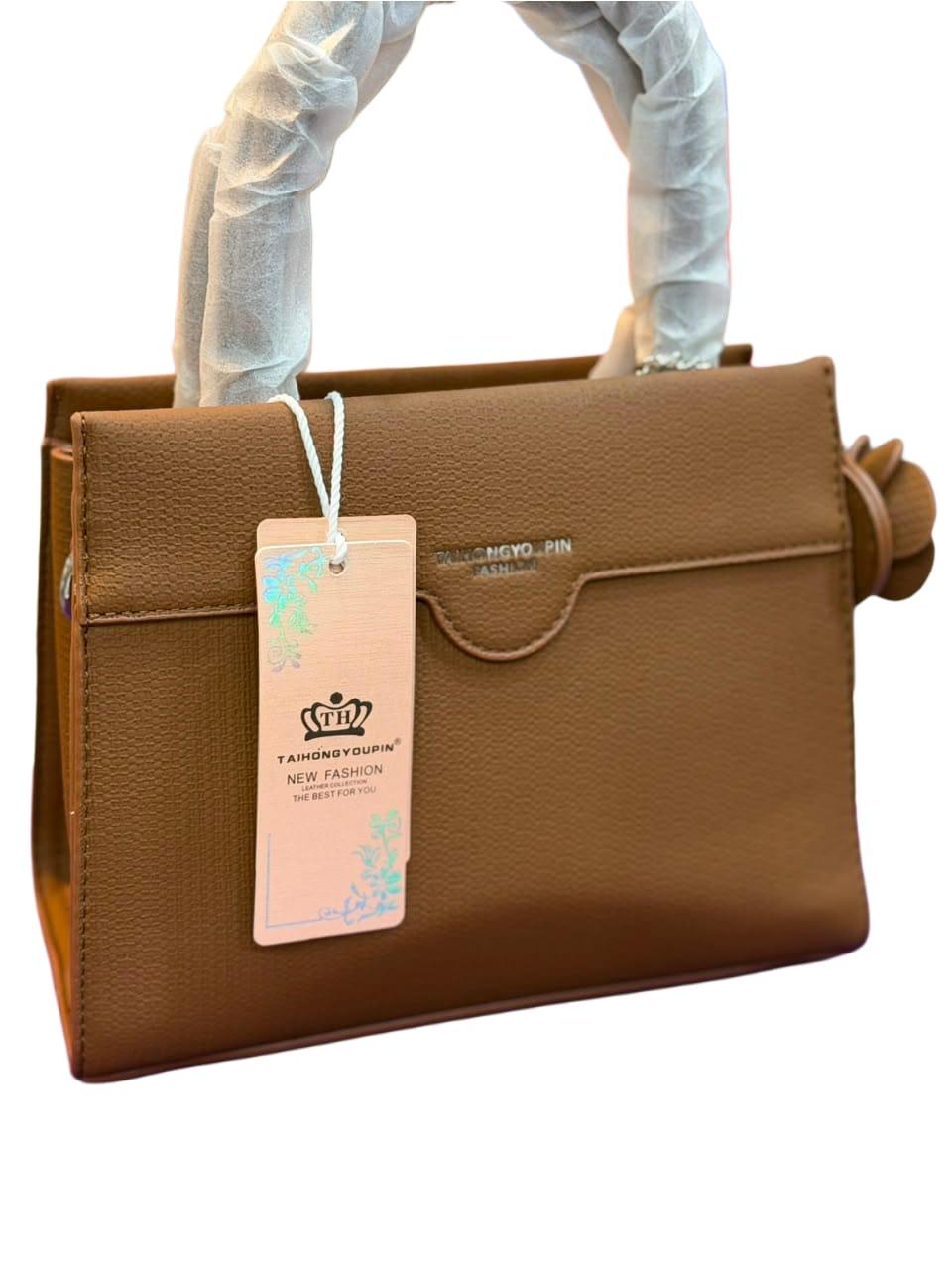 Elegant Black Top Handle Satchel Bag with Floral Charm